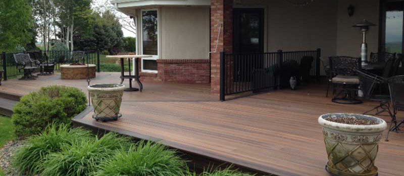 An outside area with a complete composite decking presenting a great look in the backyard 