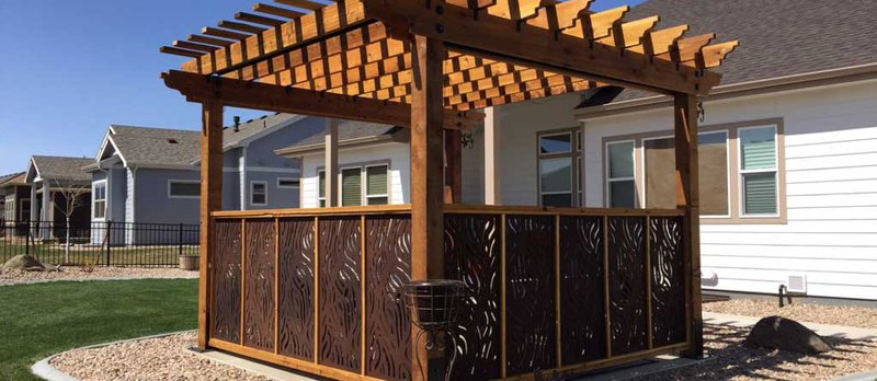 A beautiful patio standing outside a house on a perfect afternoon, constructed by a patio contractor